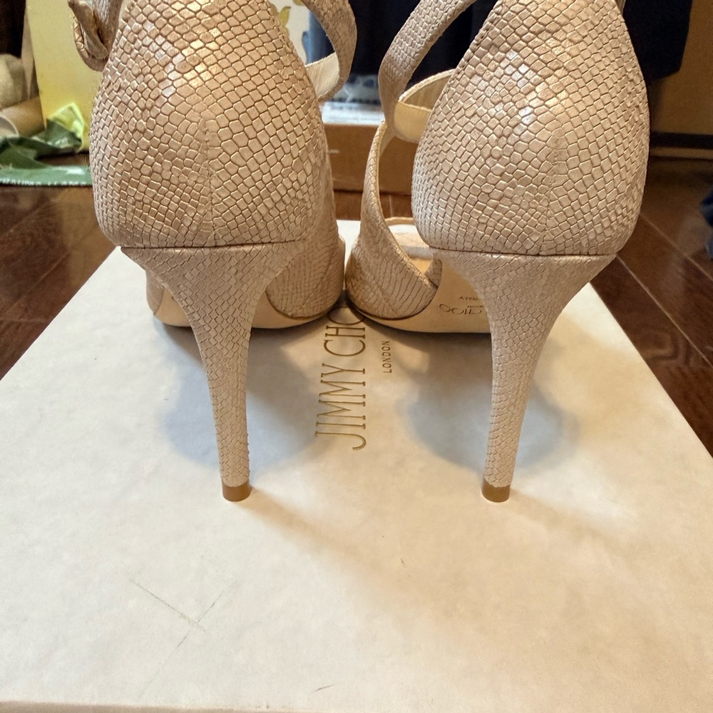 Jimmy Choo Emily 85 Nude embossed leather heels.
New in box. Size 6.5
STUNNING - Picture 7 of 13